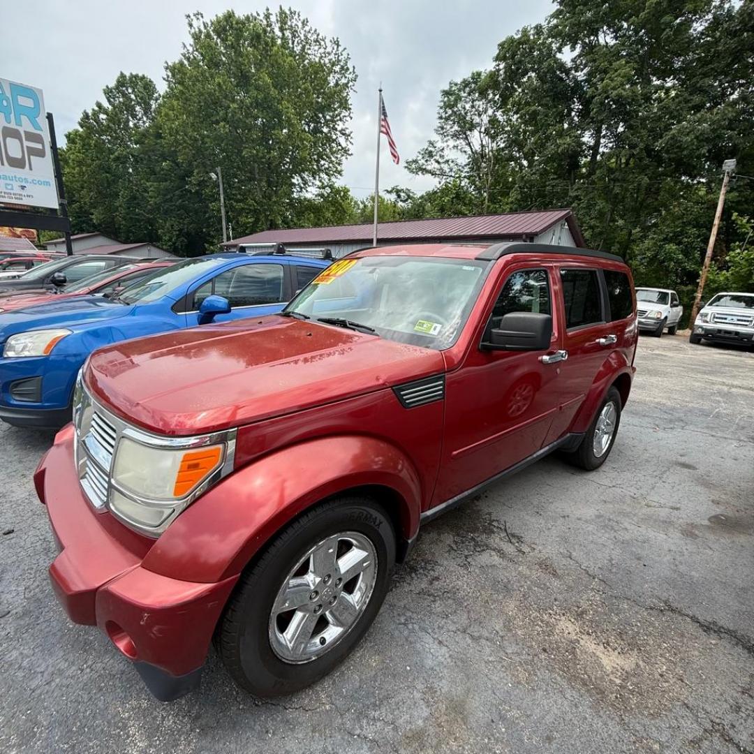 2008 RED DODGE NITRO SXT (1D8GU28K68W) with an 3.7L engine, Automatic transmission, located at 3338 US Rt. 60 East, Huntington, WV, 25705, (304) 733-9888, 38.411072, -82.379471 - Photo#2