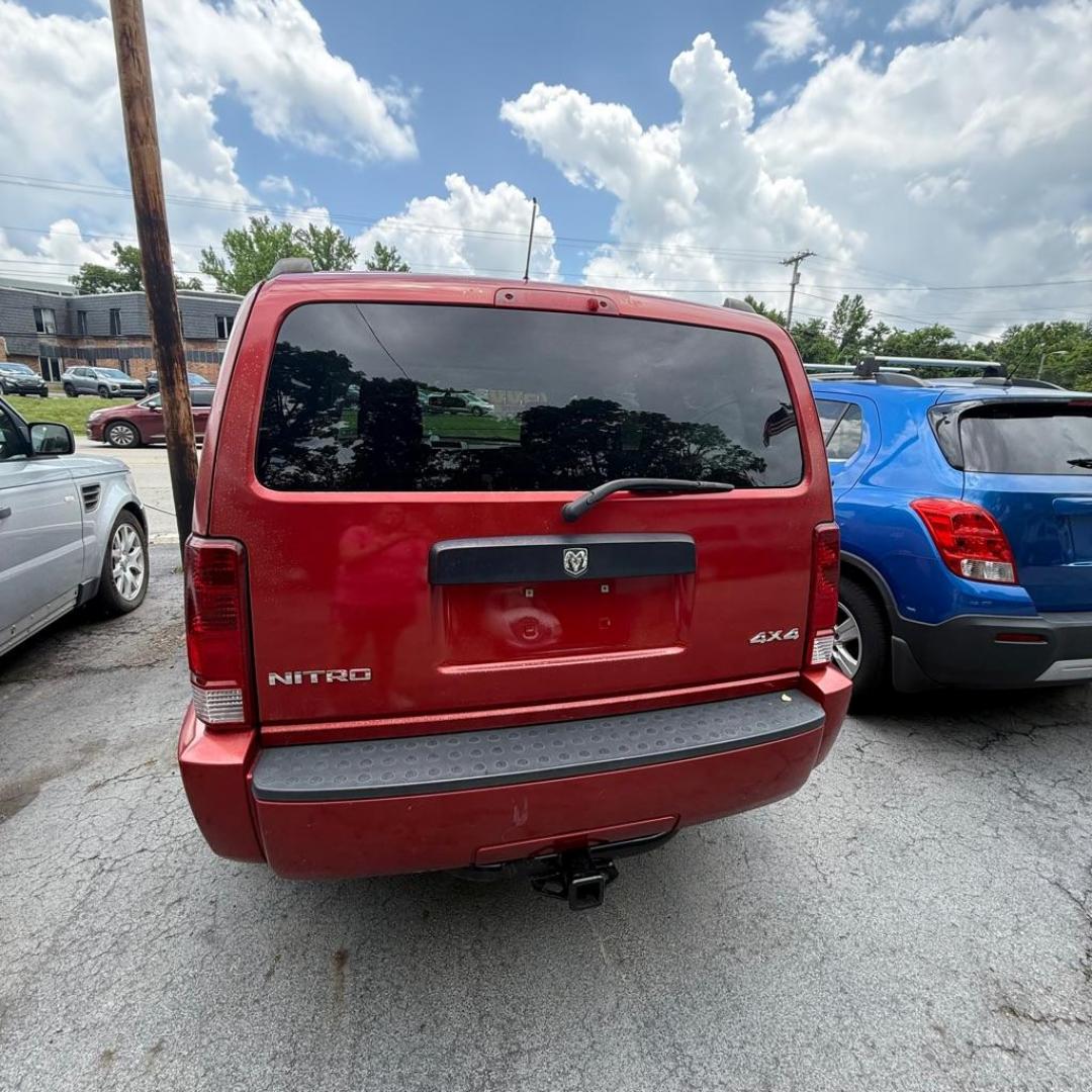 2008 RED DODGE NITRO SXT (1D8GU28K68W) with an 3.7L engine, Automatic transmission, located at 3338 US Rt. 60 East, Huntington, WV, 25705, (304) 733-9888, 38.411072, -82.379471 - Photo#3