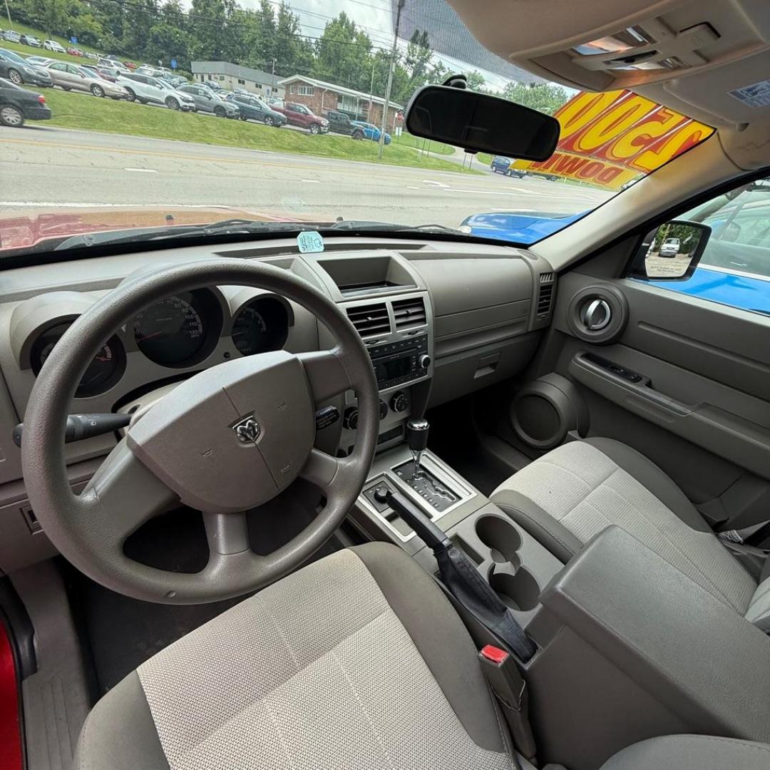 2008 RED DODGE NITRO SXT (1D8GU28K68W) with an 3.7L engine, Automatic transmission, located at 3338 US Rt. 60 East, Huntington, WV, 25705, (304) 733-9888, 38.411072, -82.379471 - Photo#5