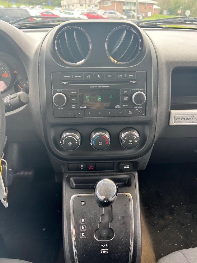 2016 GRAY JEEP COMPASS SPORT (1C4NJDBB8GD) with an 2.4L engine, Continuously Variable transmission, located at 3338 US Rt. 60 East, Huntington, WV, 25705, (304) 733-9888, 38.411072, -82.379471 - Photo#7