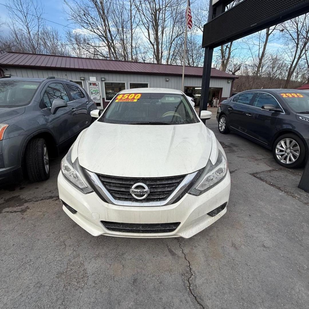 2016 WHITE NISSAN ALTIMA 2.5 SL (1N4AL3AP8GC) with an 2.5L engine, Continuously Variable transmission, located at 3338 US Rt. 60 East, Huntington, WV, 25705, (304) 733-9888, 38.411072, -82.379471 - Photo#0