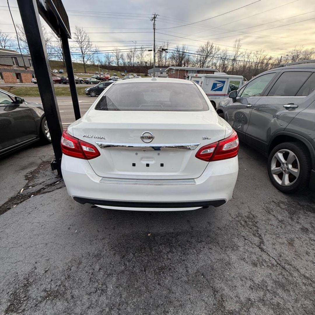 2016 WHITE NISSAN ALTIMA 2.5 SL (1N4AL3AP8GC) with an 2.5L engine, Continuously Variable transmission, located at 3338 US Rt. 60 East, Huntington, WV, 25705, (304) 733-9888, 38.411072, -82.379471 - Photo#3