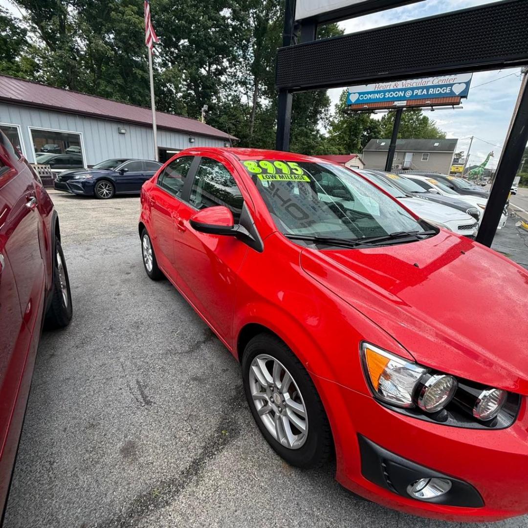 2014 RED CHEVROLET SONIC LT (1G1JC5SH6E4) with an 1.8L engine, Automatic transmission, located at 3338 US Rt. 60 East, Huntington, WV, 25705, (304) 733-9888, 38.411072, -82.379471 - Photo#1