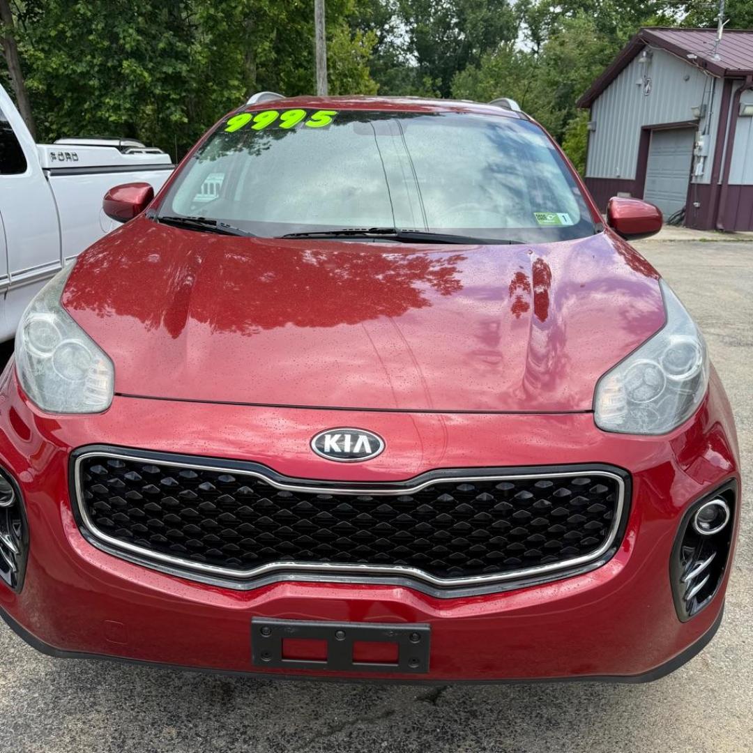 2017 RED KIA SPORTAGE LX (KNDPMCAC0H7) with an 2.4L engine, Automatic transmission, located at 3338 US Rt. 60 East, Huntington, WV, 25705, (304) 733-9888, 38.411072, -82.379471 - Photo#0