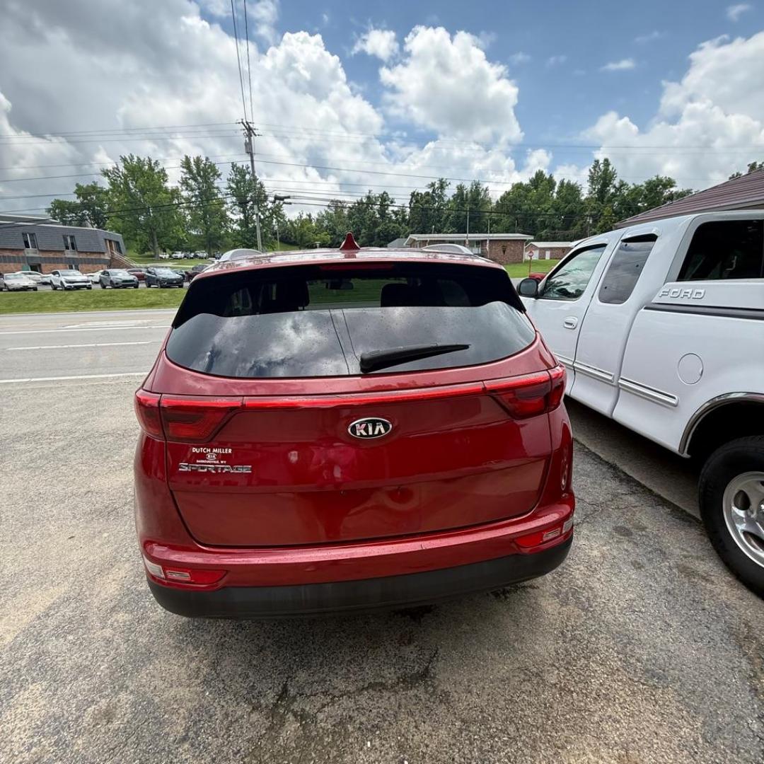 2017 RED KIA SPORTAGE LX (KNDPMCAC0H7) with an 2.4L engine, Automatic transmission, located at 3338 US Rt. 60 East, Huntington, WV, 25705, (304) 733-9888, 38.411072, -82.379471 - Photo#3