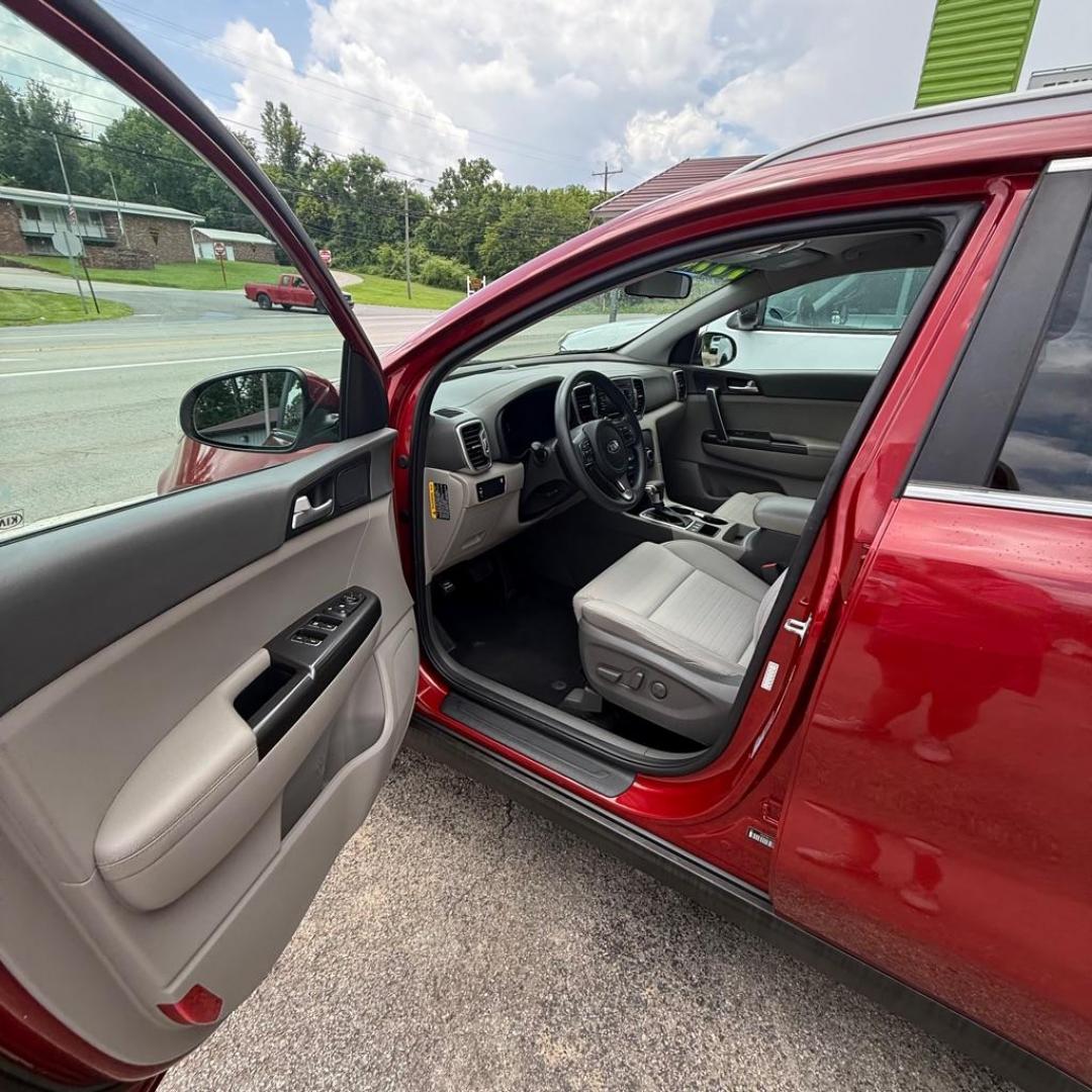 2017 RED KIA SPORTAGE LX (KNDPMCAC0H7) with an 2.4L engine, Automatic transmission, located at 3338 US Rt. 60 East, Huntington, WV, 25705, (304) 733-9888, 38.411072, -82.379471 - Photo#5