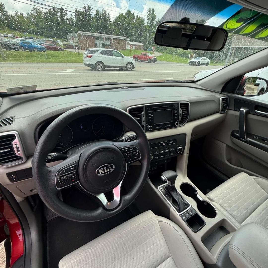 2017 RED KIA SPORTAGE LX (KNDPMCAC0H7) with an 2.4L engine, Automatic transmission, located at 3338 US Rt. 60 East, Huntington, WV, 25705, (304) 733-9888, 38.411072, -82.379471 - Photo#7